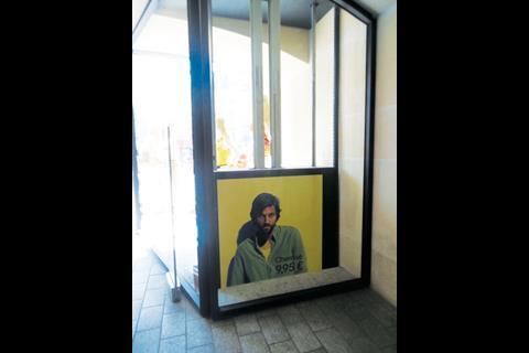 H&M’s outsize screens are dotted on vertical rails and travel from floor to floor